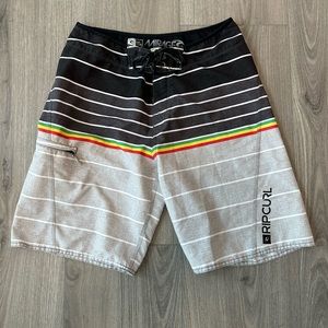 Rip Curl sz 30 Mirage board shorts EUC with bottle opener and comb black grey